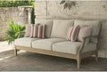 Signature Design by Ashley Clare View Outdoor Patio Sofa, 4 Throw Pillows by SignatureDesignbyAshley